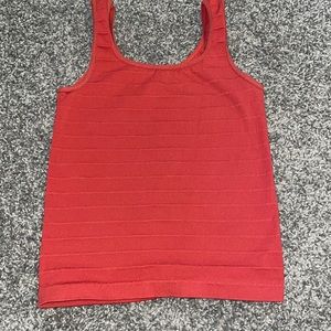 Burnt orange tank top.